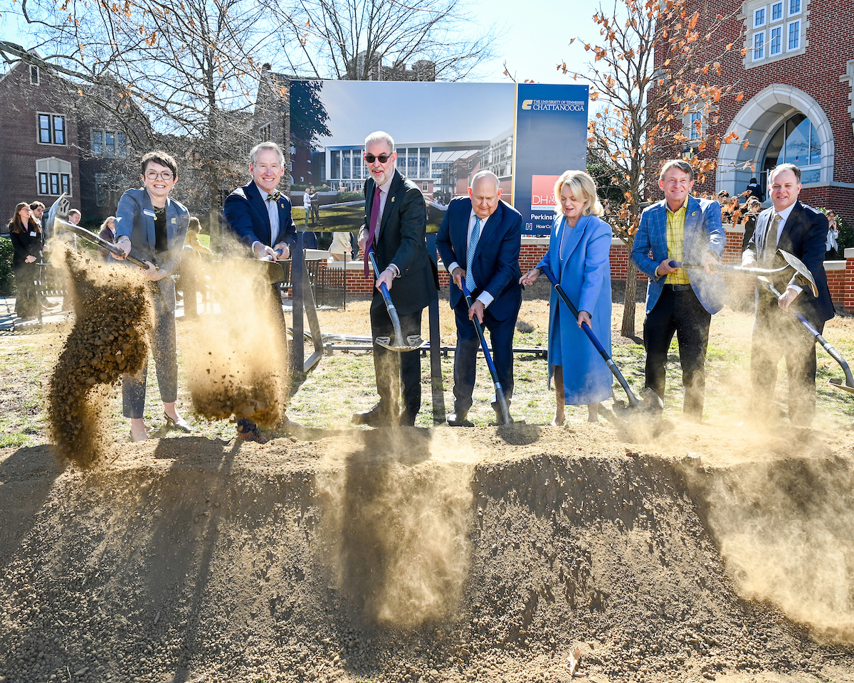 Officials attend a groundbreaking ceremony Monday, Mar. 3, 2025 for the addition to the Gary W. Rollins Business school.