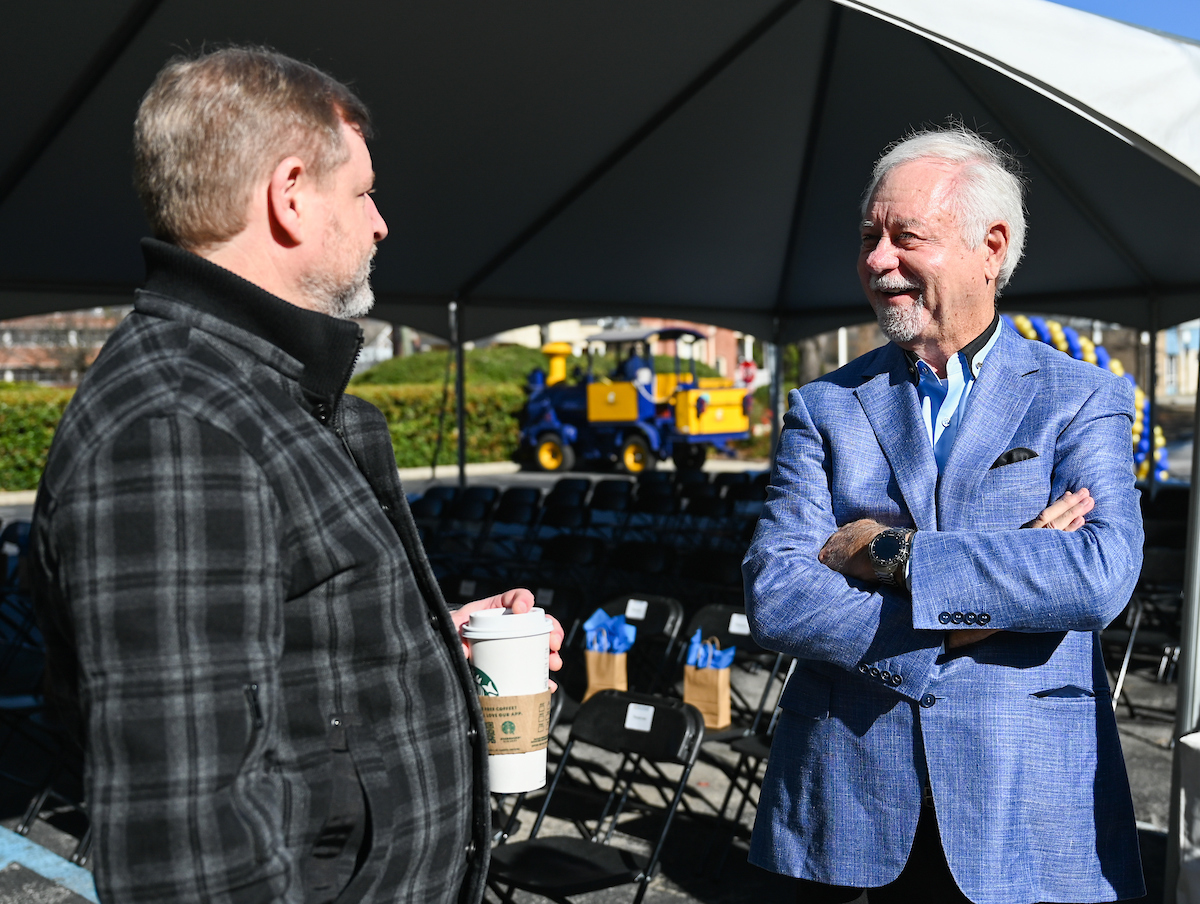 Officials attend a groundbreaking ceremony Monday, Mar. 3, 2025 for the addition to the Gary W. Rollins Business school.