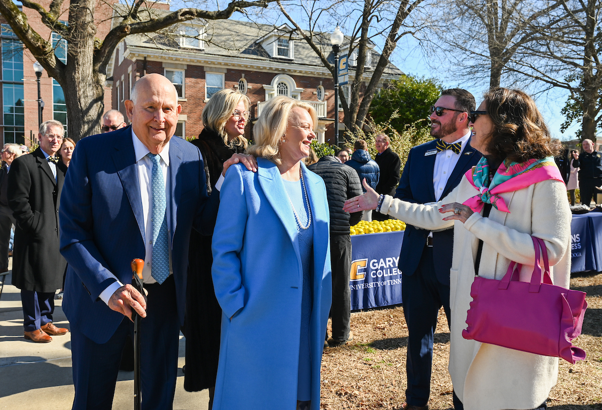 Officials attend a groundbreaking ceremony Monday, Mar. 3, 2025 for the addition to the Gary W. Rollins Business school.