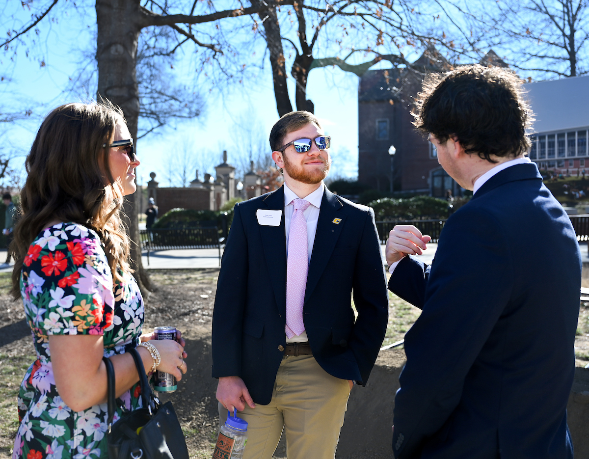 Officials attend a groundbreaking ceremony Monday, Mar. 3, 2025 for the addition to the Gary W. Rollins Business school.