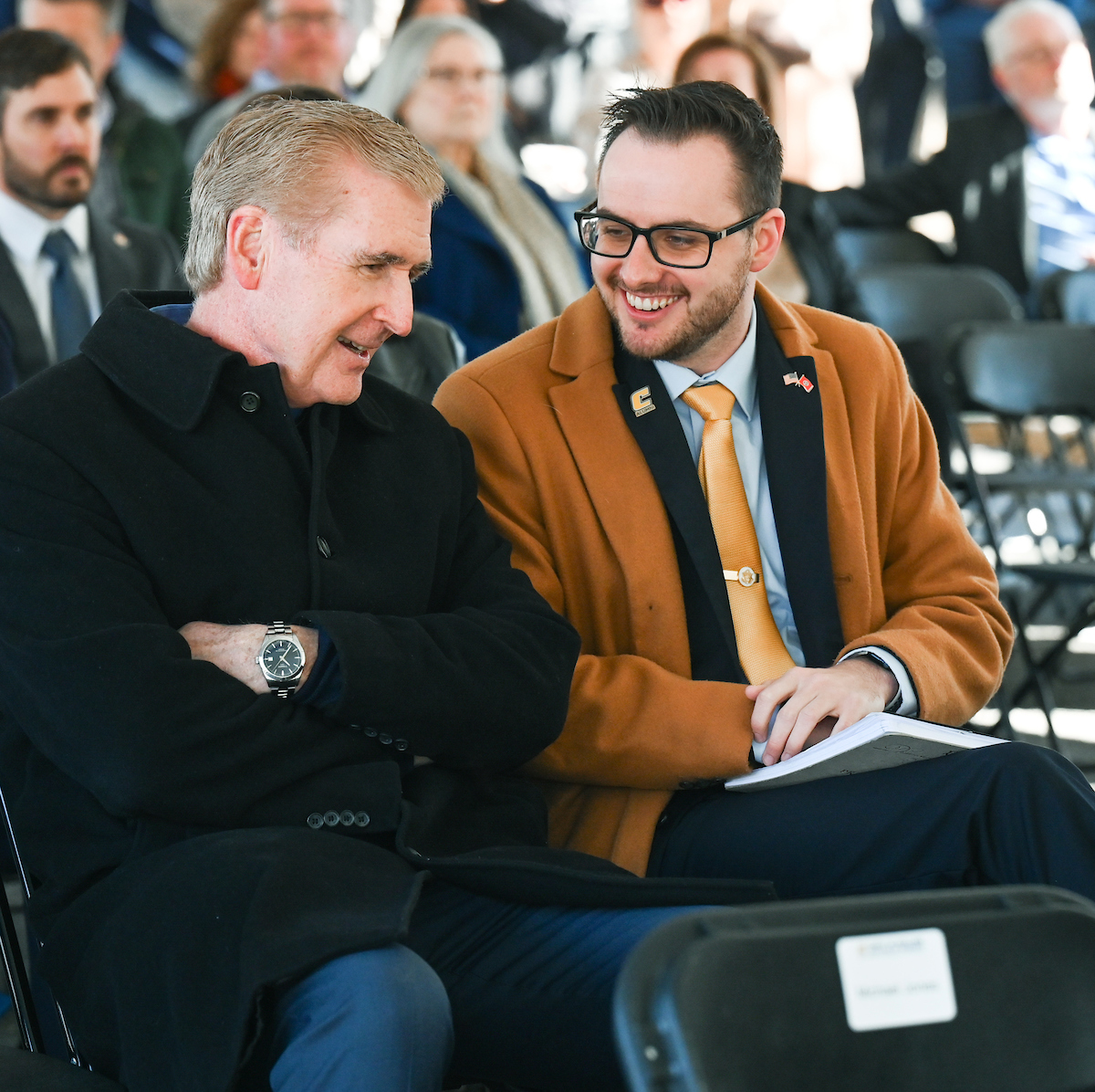 Officials attend a groundbreaking ceremony Monday, Mar. 3, 2025 for the addition to the Gary W. Rollins Business school.