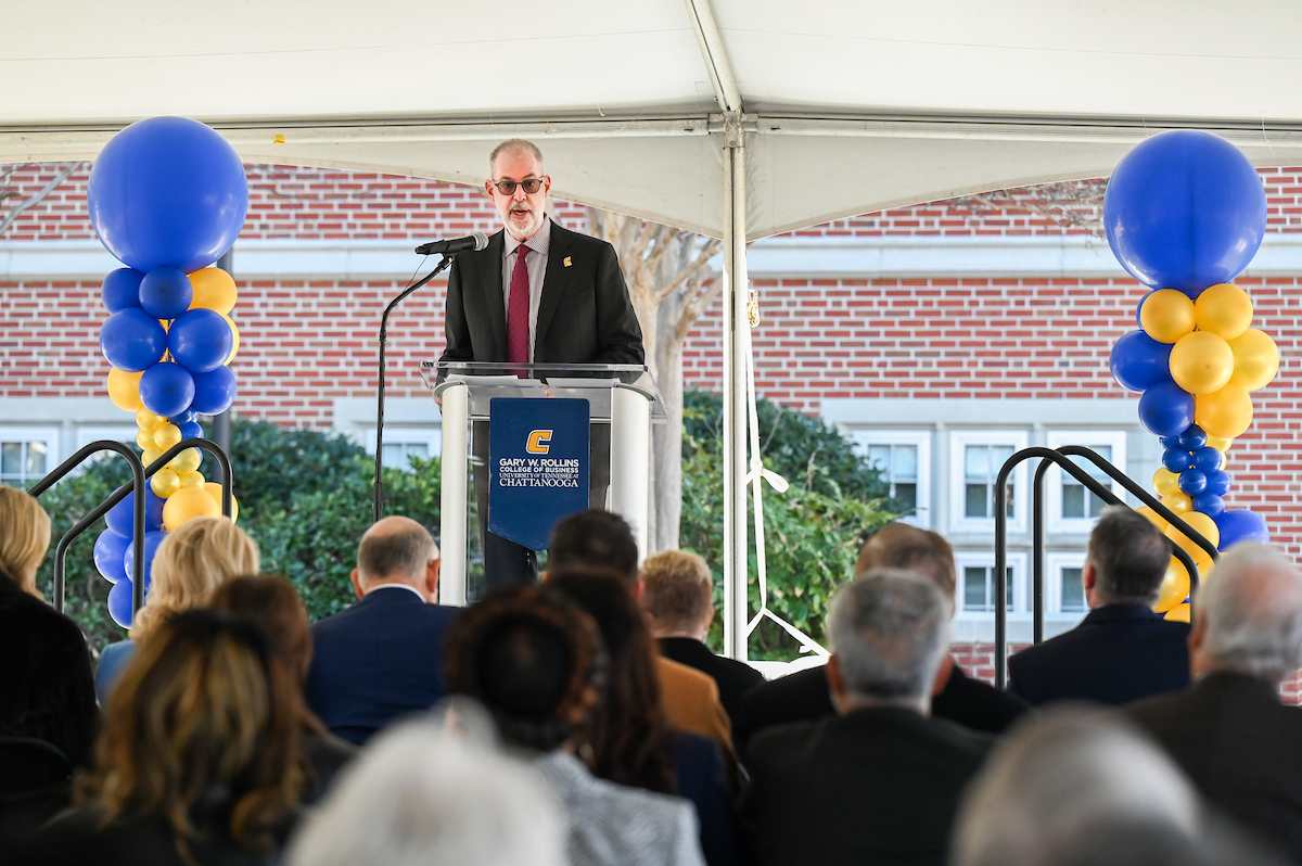 Officials attend a groundbreaking ceremony Monday, Mar. 3, 2025 for the addition to the Gary W. Rollins Business school.