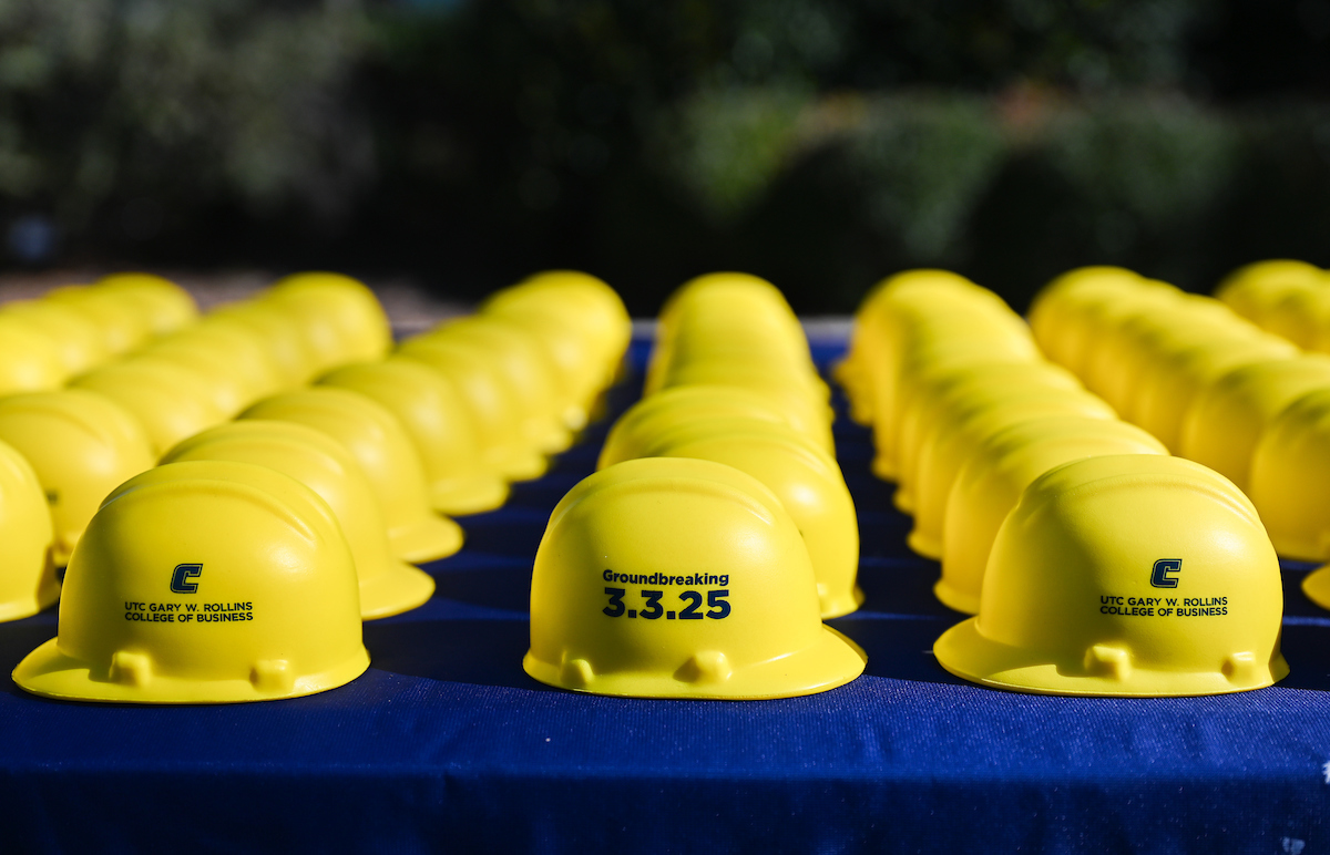 Officials attend a groundbreaking ceremony Monday, Mar. 3, 2025 for the addition to the Gary W. Rollins Business school.