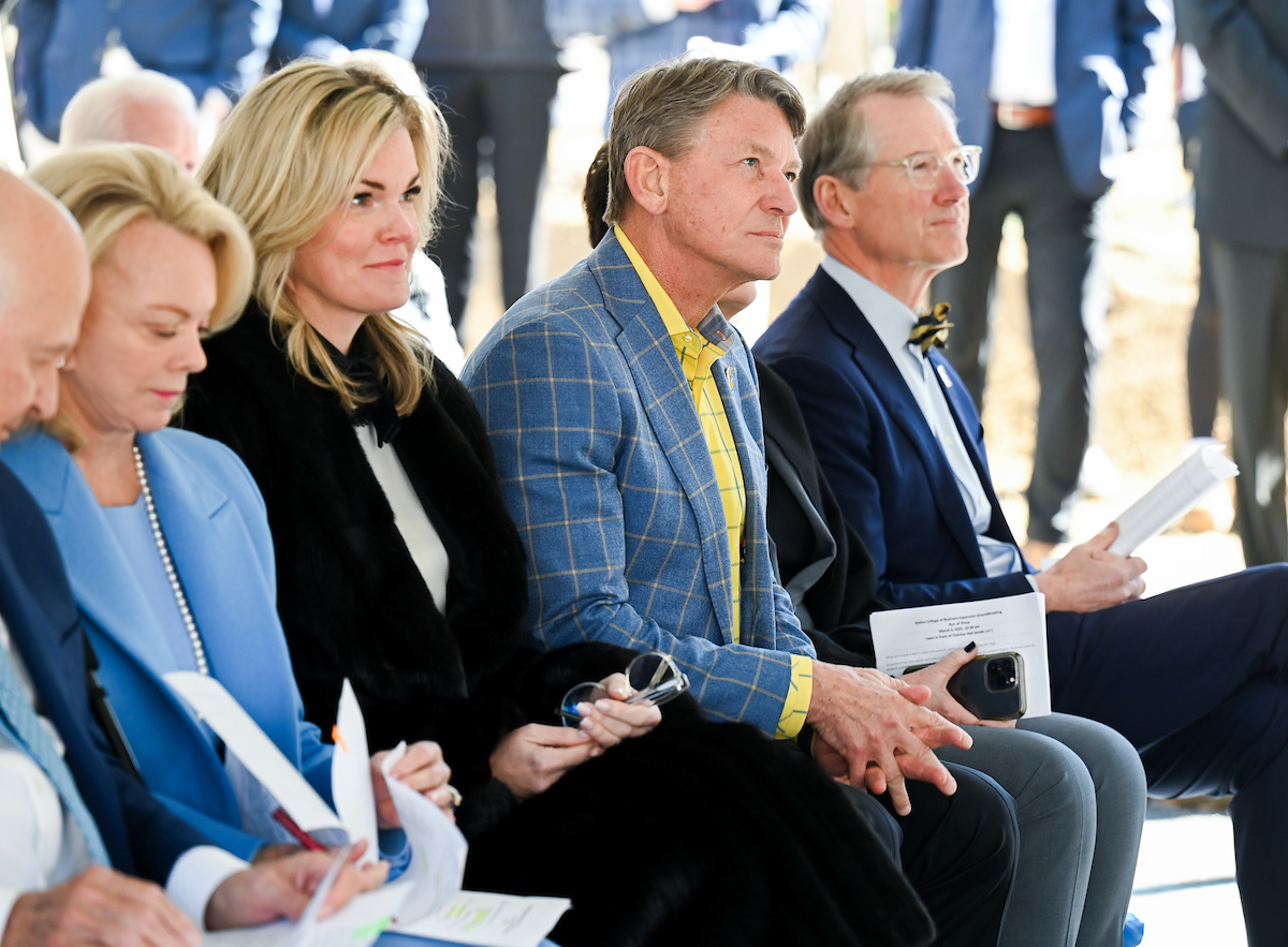 Officials attend a groundbreaking ceremony Monday, Mar. 3, 2025 for the addition to the Gary W. Rollins Business school.