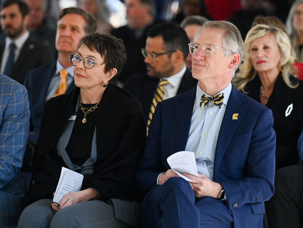 Officials attend a groundbreaking ceremony Monday, Mar. 3, 2025 for the addition to the Gary W. Rollins Business school.