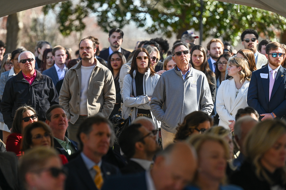Officials attend a groundbreaking ceremony Monday, Mar. 3, 2025 for the addition to the Gary W. Rollins Business school.