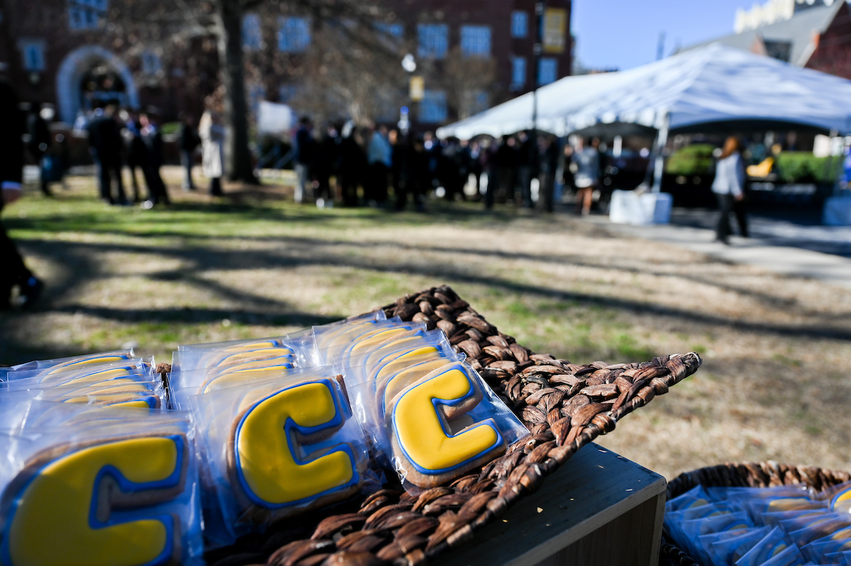 Officials attend a groundbreaking ceremony Monday, Mar. 3, 2025 for the addition to the Gary W. Rollins Business school.