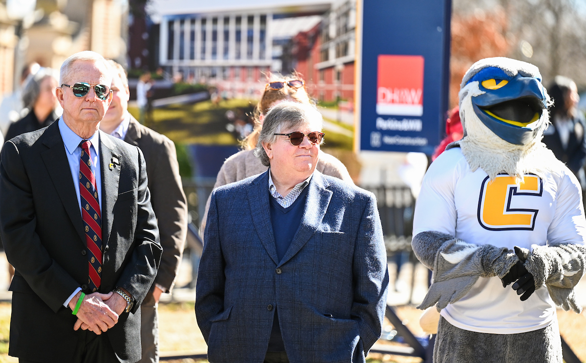 Officials attend a groundbreaking ceremony Monday, Mar. 3, 2025 for the addition to the Gary W. Rollins Business school.