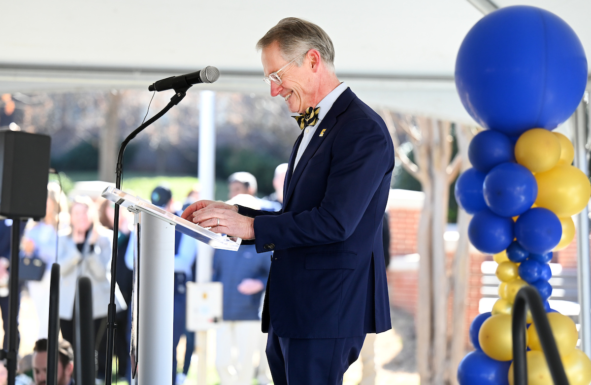 Officials attend a groundbreaking ceremony Monday, Mar. 3, 2025 for the addition to the Gary W. Rollins Business school.