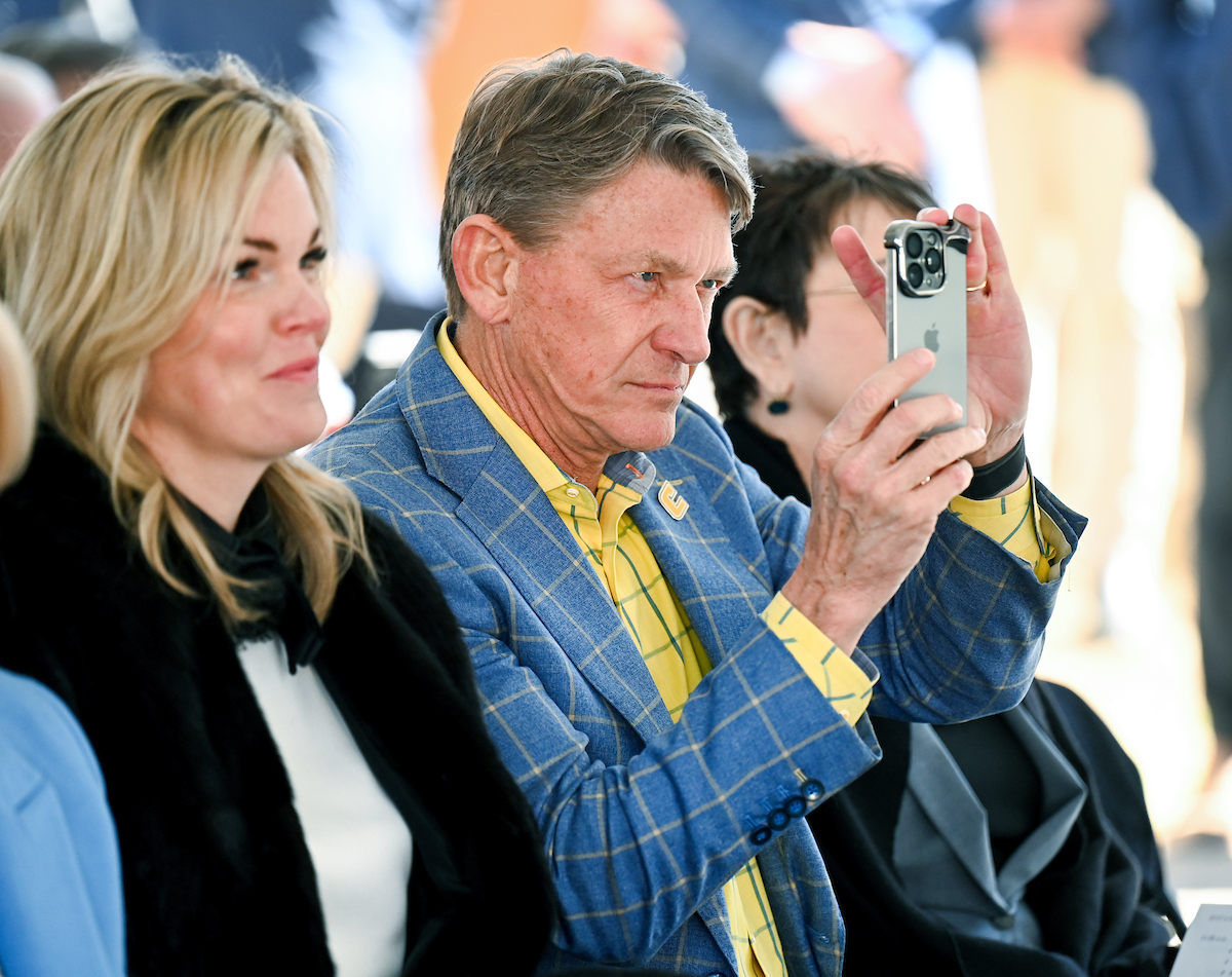 Officials attend a groundbreaking ceremony Monday, Mar. 3, 2025 for the addition to the Gary W. Rollins Business school.