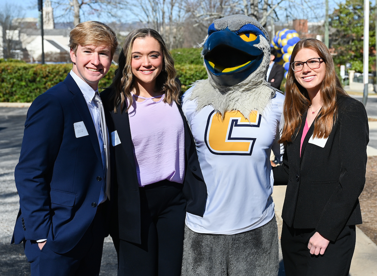 Officials attend a groundbreaking ceremony Monday, Mar. 3, 2025 for the addition to the Gary W. Rollins Business school.