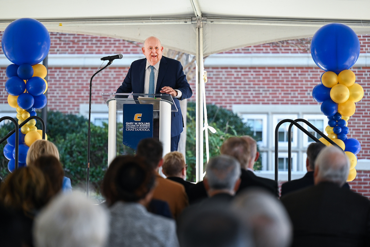 Officials attend a groundbreaking ceremony Monday, Mar. 3, 2025 for the addition to the Gary W. Rollins Business school.