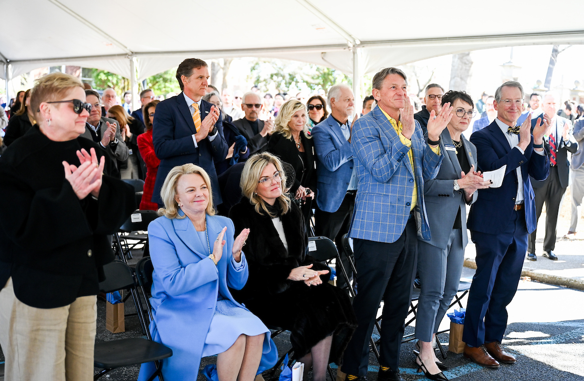 Officials attend a groundbreaking ceremony Monday, Mar. 3, 2025 for the addition to the Gary W. Rollins Business school.