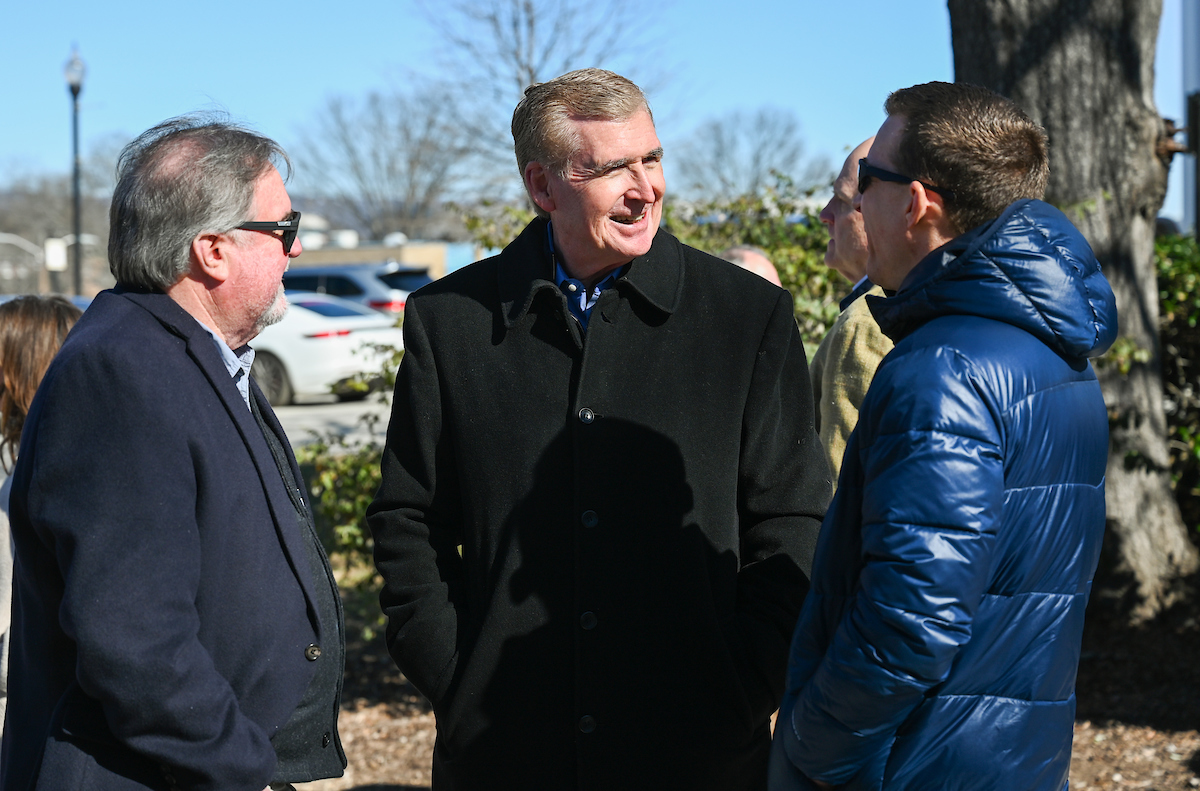 Officials attend a groundbreaking ceremony Monday, Mar. 3, 2025 for the addition to the Gary W. Rollins Business school.