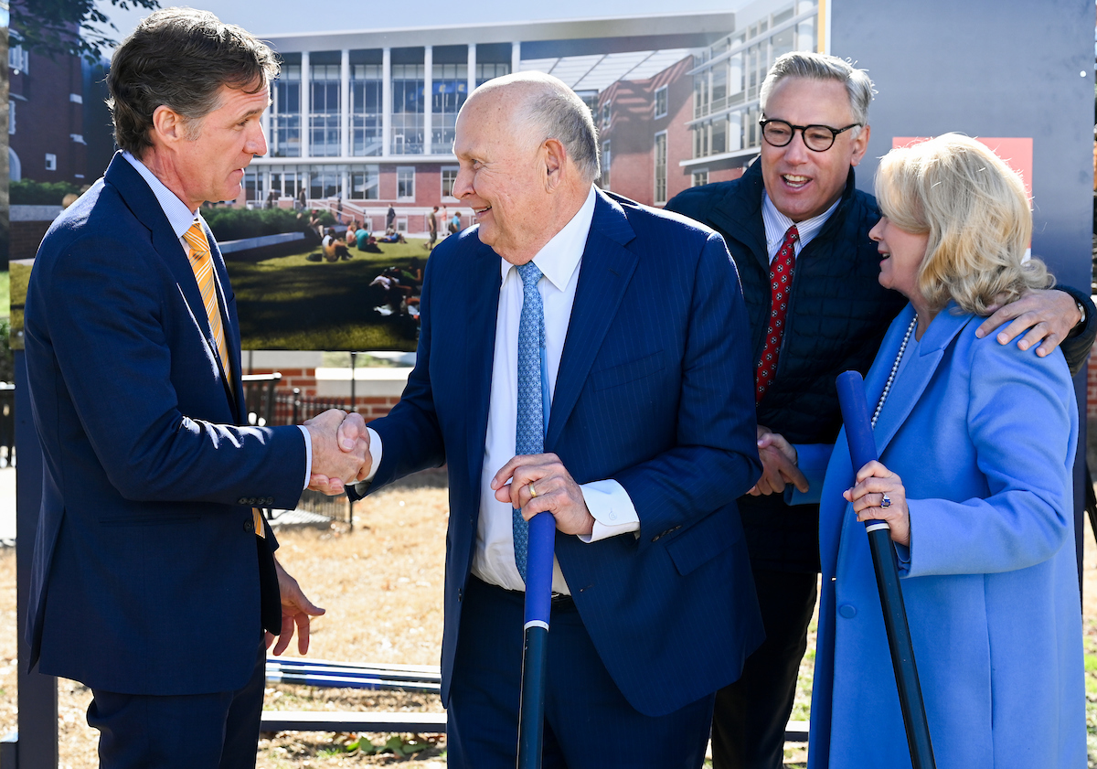 Officials attend a groundbreaking ceremony Monday, Mar. 3, 2025 for the addition to the Gary W. Rollins Business school.