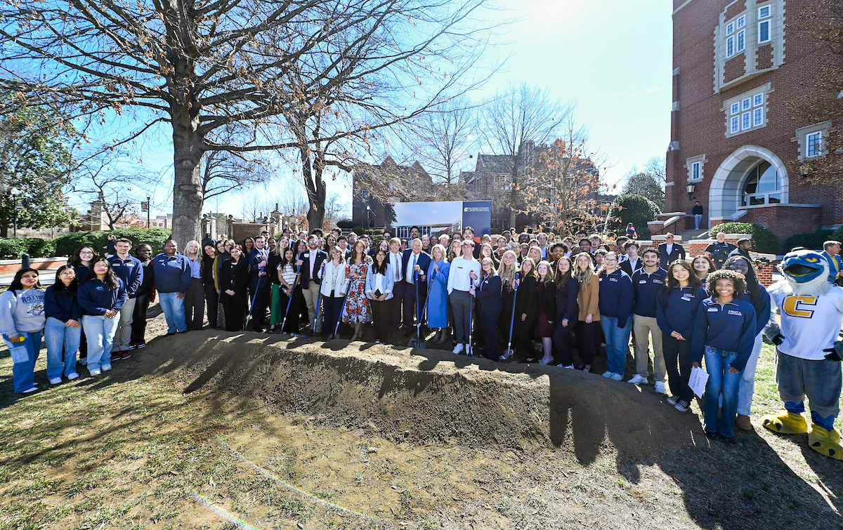 Officials attend a groundbreaking ceremony Monday, Mar. 3, 2025 for the addition to the Gary W. Rollins Business school.