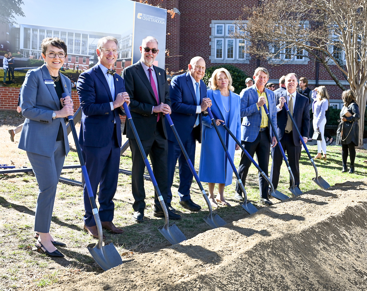 Officials attend a groundbreaking ceremony Monday, Mar. 3, 2025 for the addition to the Gary W. Rollins Business school.