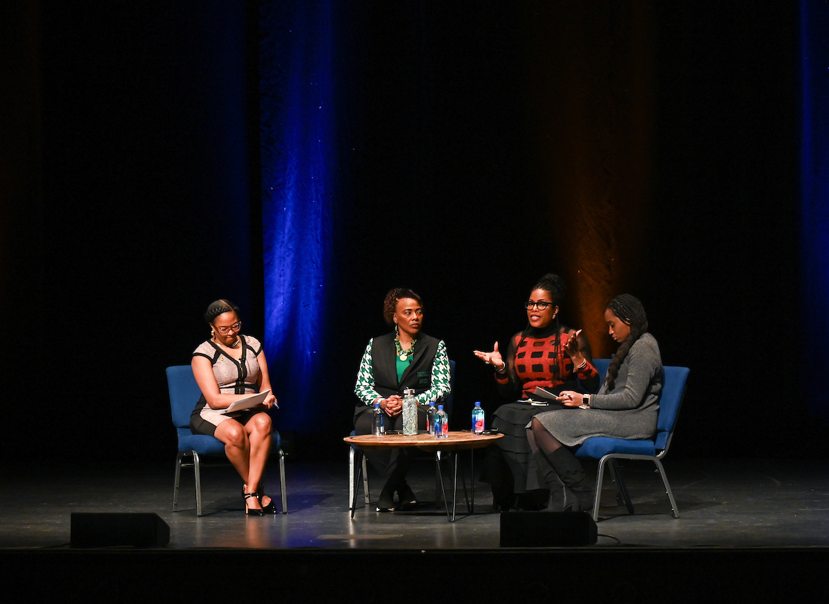 Chamyra Teasley (right) co-moderated a discussion with Dr. Bernice King (green top) and Dr. Ilyasah Shabazz (red top) for UTC's 2024 MLK Day celebration.