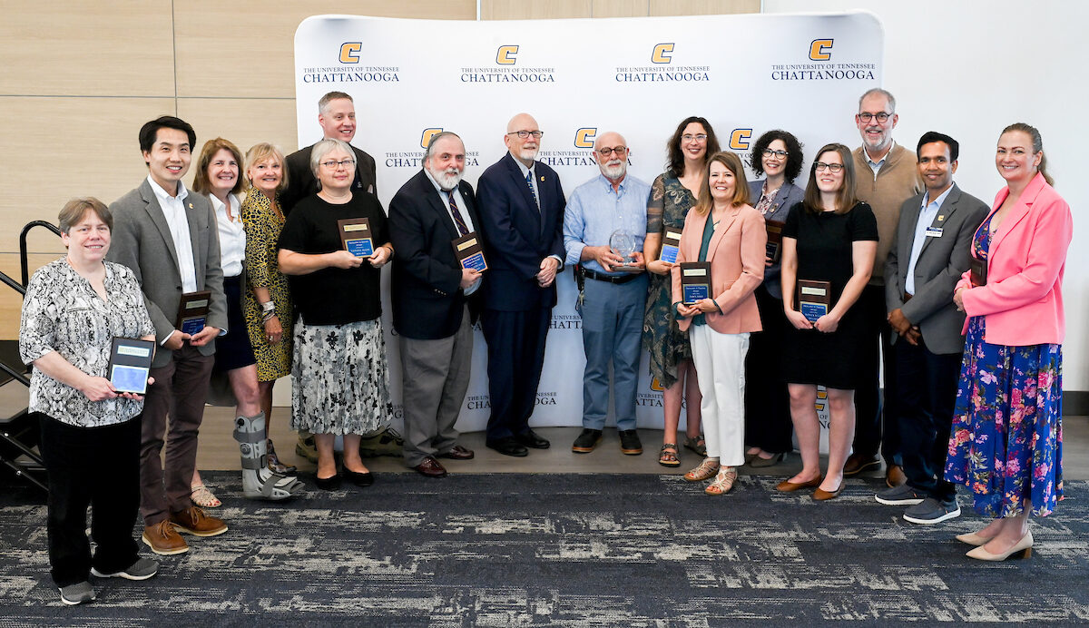 From left: Michelle Evans, Tian Li, Beth Crawford, Jamie Harvey, Tatiana Allen, Chuck Margraves, Gary McDonald, Provost Jerold Hale, Irv Resnick, Hilary Browder-Terry, Dawn Ford, Laurie Melnik Allen, Monica Miles, Interim Chancellor Robert Dooley, Jejal Bathi and Ruth Walker. Photo by Angela Foster.