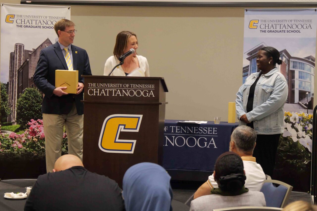 Kalyn Carr, right, being presented the Outstanding Master’s Student Award for the Social Work – Advanced Standing graduate program from Dr. Christina Policastro, assistant dean of the Graduate School.
