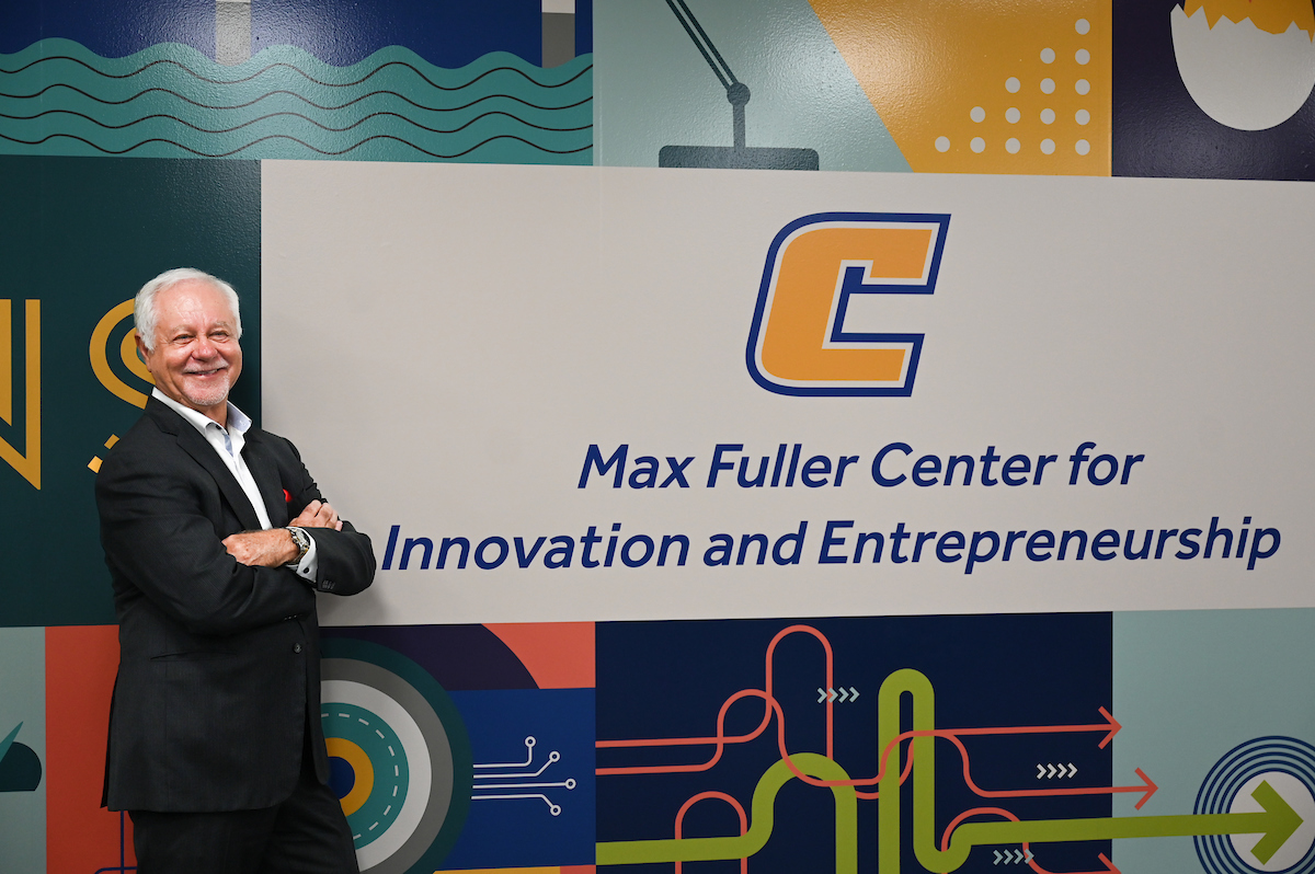 Max Fuller, a 1975 UTC graduate and co-founder of U.S. Xpress, Inc., stands in the center now bearing his name following a $5 million gift to UTC. Photo by Angela Foster.