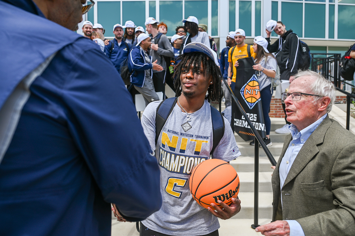Men’s basketball team members return to McKenzie Arena Friday, Apr. 4, 2025 after winning the NIT tournament in Indianapolis, IN.