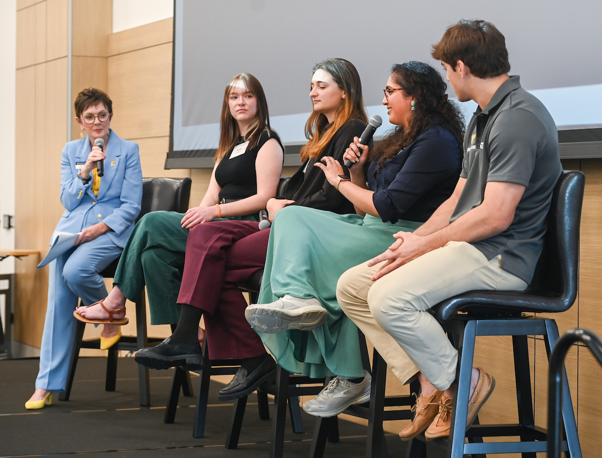 The Scholarship Luncheon student panel included moderator Kim White (left), Katie Collins, Erin Jones, Sara Mathews and Sergio Desiante. Photo by Angela Foster.
