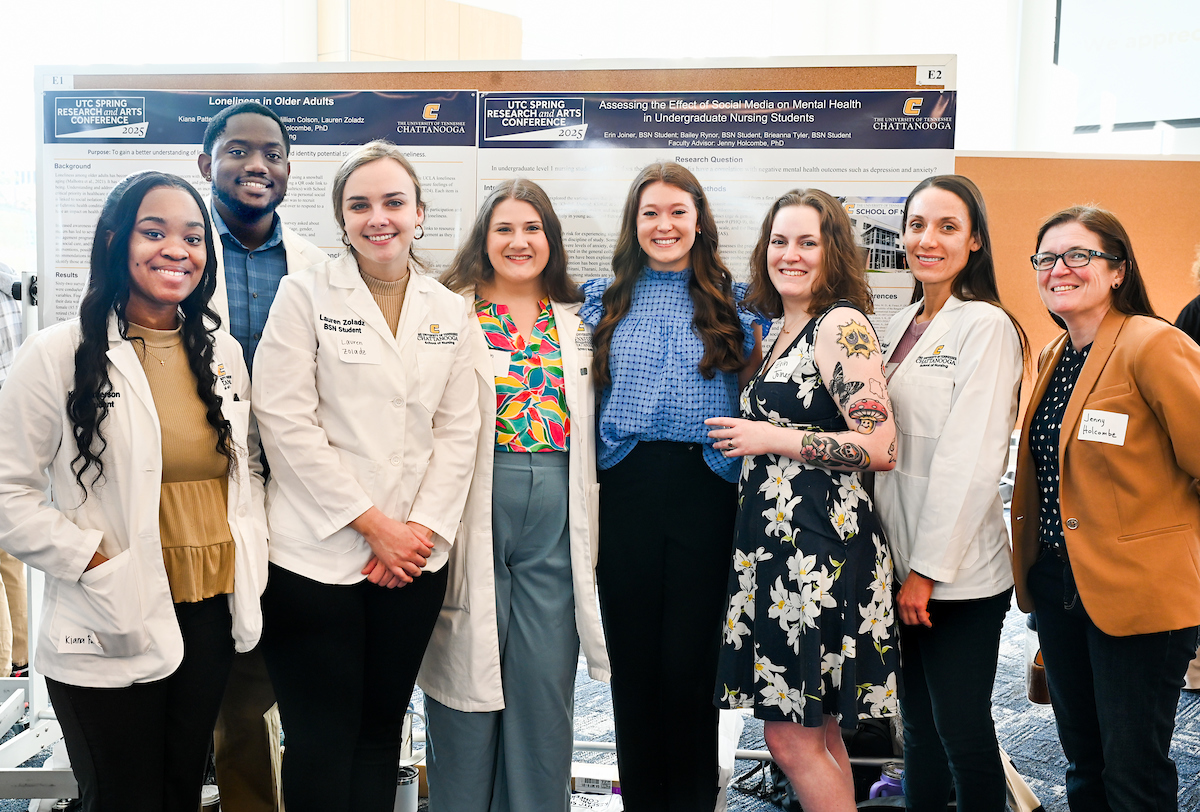 Kiana Patterson (left) and Jillian Colson (colorful top) with other School of Nursing students.