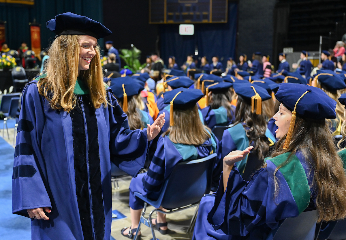 Students attend the graduate school graduation ceremony Friday, May 2, 2025 in McKenzie Arena.