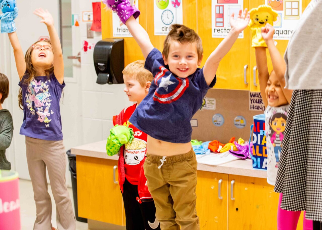 Pre-K children show their emotions through puppetry at Wallace A. Smith Elementary School. Photo courtesy of the Arts-Based Collaborative.