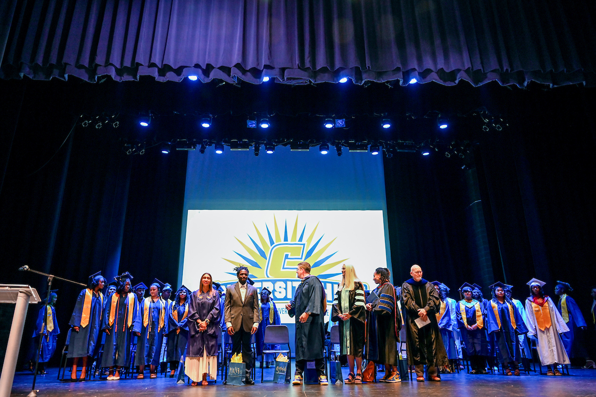 University High students participate in a graduation ceremony Friday, May 9, 2025 in the Fine Arts Center.
