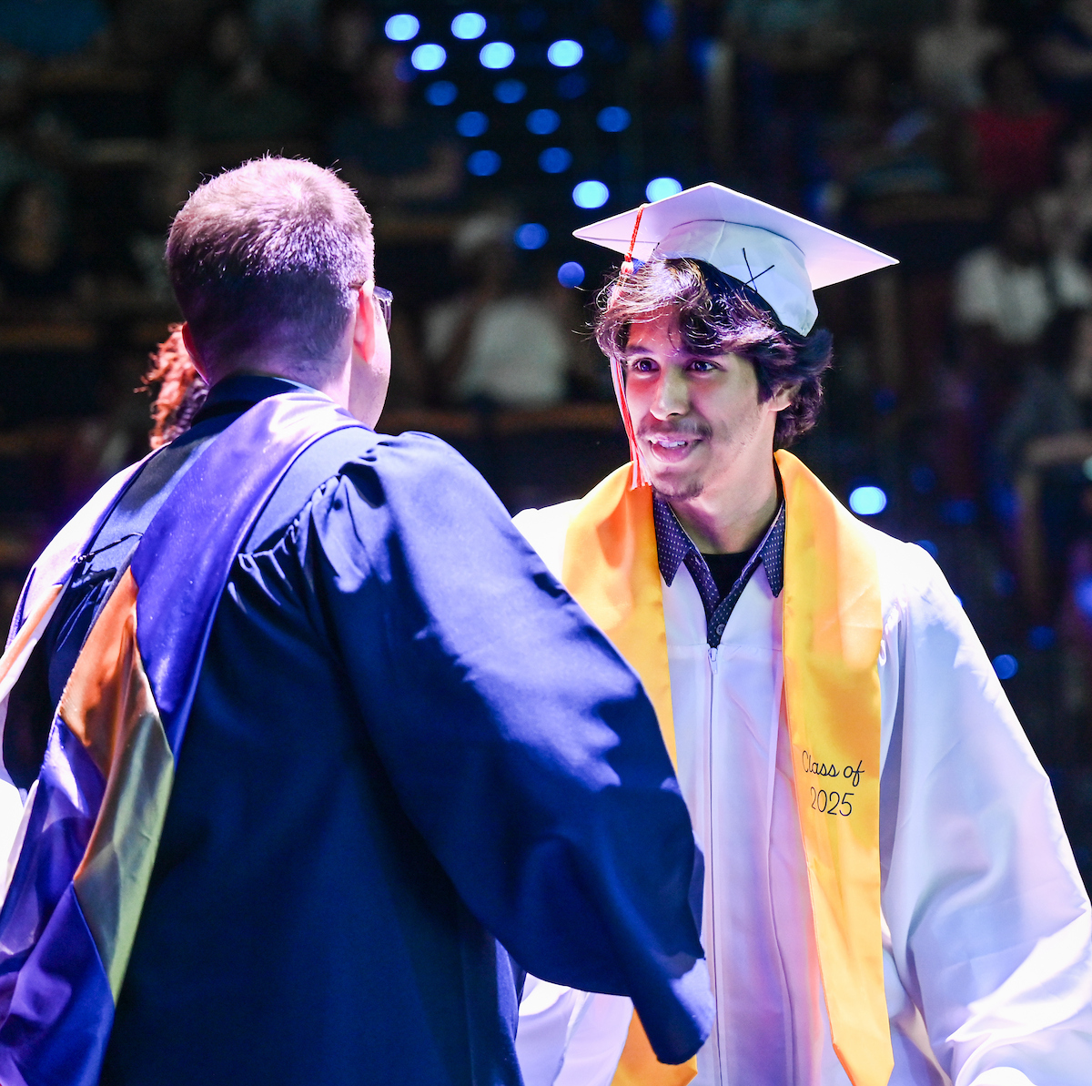 University High students participate in a graduation ceremony Friday, May 9, 2025 in the Fine Arts Center.