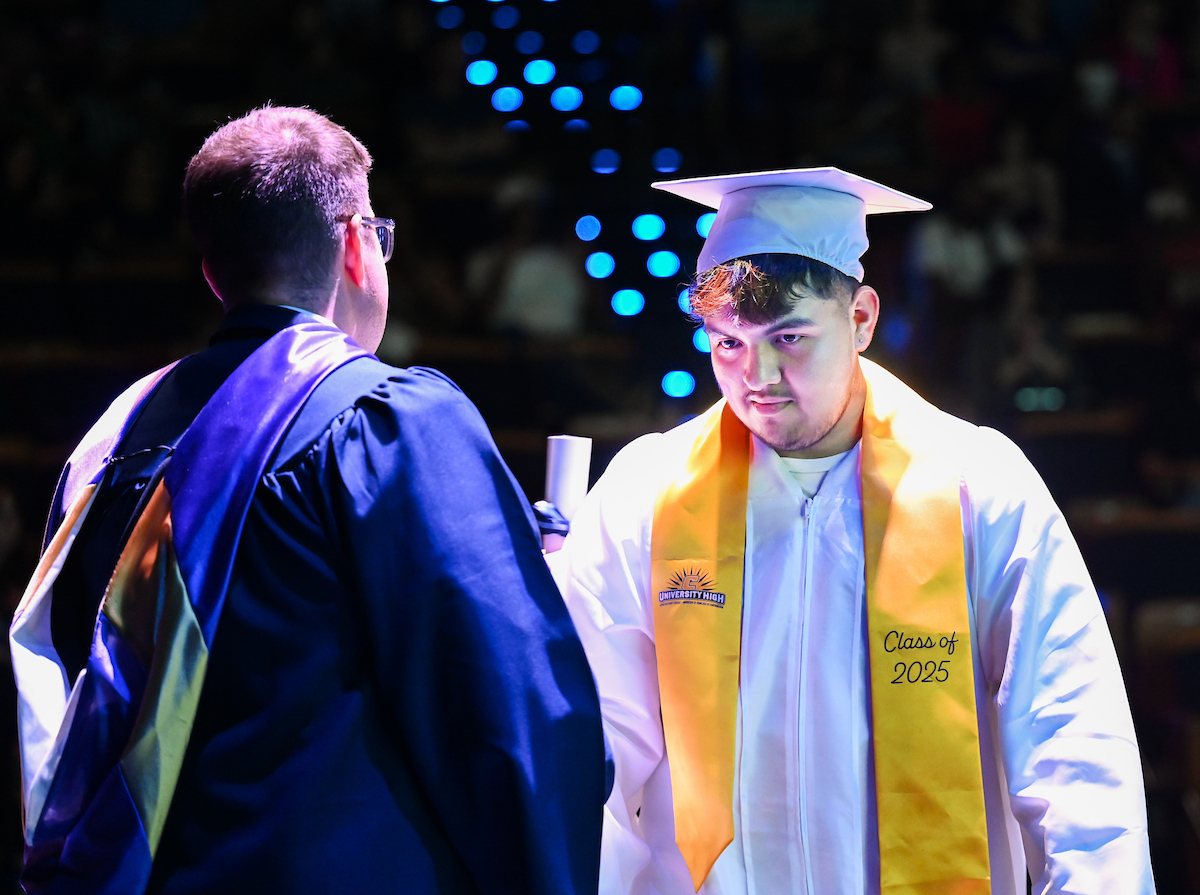 University High students participate in a graduation ceremony Friday, May 9, 2025 in the Fine Arts Center.