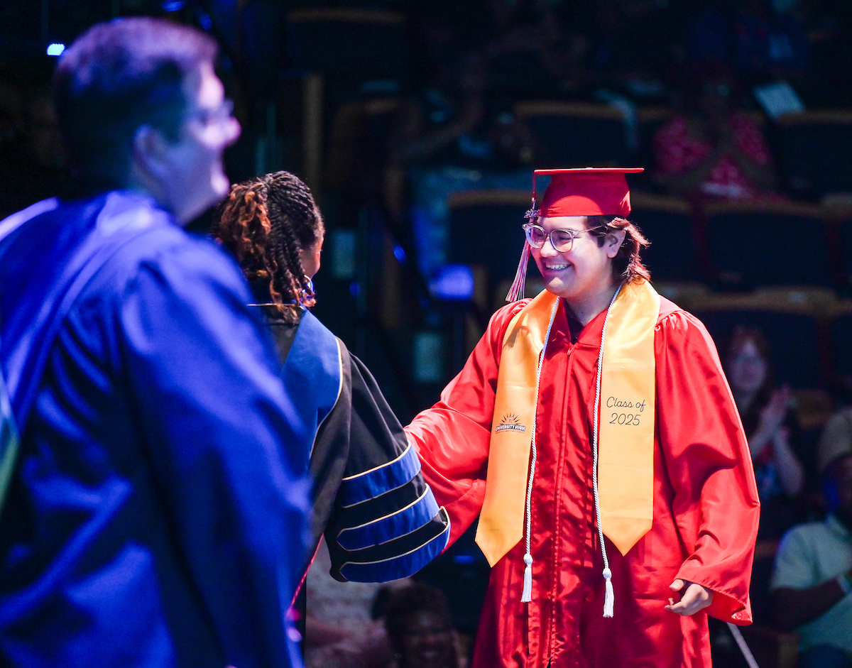 University High students participate in a graduation ceremony Friday, May 9, 2025 in the Fine Arts Center.