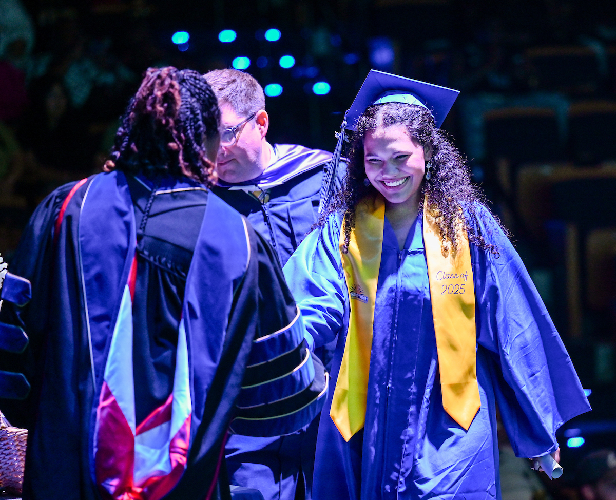 University High students participate in a graduation ceremony Friday, May 9, 2025 in the Fine Arts Center.