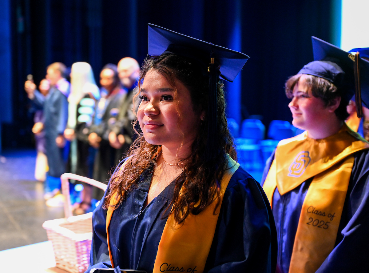 University High students participate in a graduation ceremony Friday, May 9, 2025 in the Fine Arts Center.