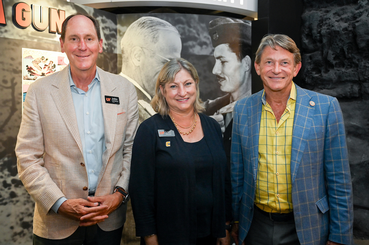 People mingle during the Board of Trustees dinner Monday, June 30 at the Medal of Honor Museum.