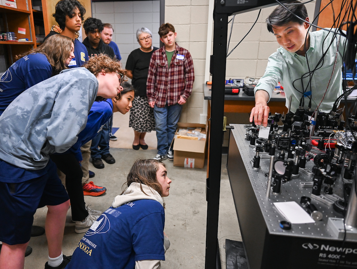 Dr. Tian Li, shown leading a demonstration at UTC’s recent Quantum Summer Camp for rising 10th-12th graders, is chief technology officer of the UTC Quantum Center and an assistant professor in the Department of Chemistry and Physics. Photo by Angela Foster.