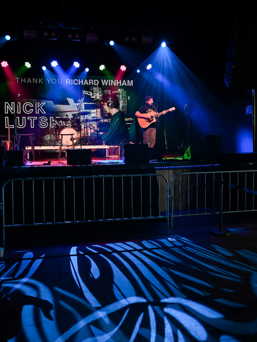 People attend a WUTC fundraiser Sunday, June 22, 2025 at Barrelhouse Ballroom to honor Richard Windham, who is retiring after 40 years.