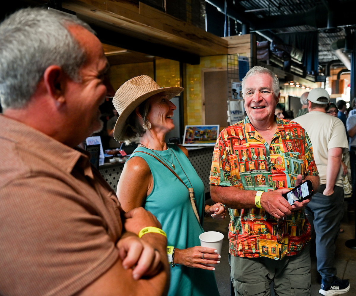 People attend a WUTC fundraiser Sunday, June 22, 2025 at Barrelhouse Ballroom to honor Richard Windham, who is retiring after 40 years.
