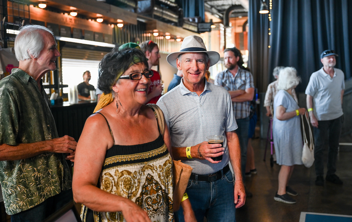 People attend a WUTC fundraiser Sunday, June 22, 2025 at Barrelhouse Ballroom to honor Richard Windham, who is retiring after 40 years.
