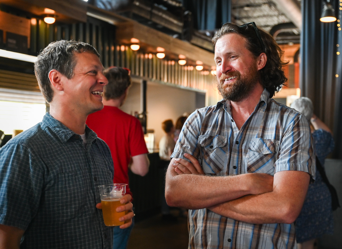 People attend a WUTC fundraiser Sunday, June 22, 2025 at Barrelhouse Ballroom to honor Richard Windham, who is retiring after 40 years.