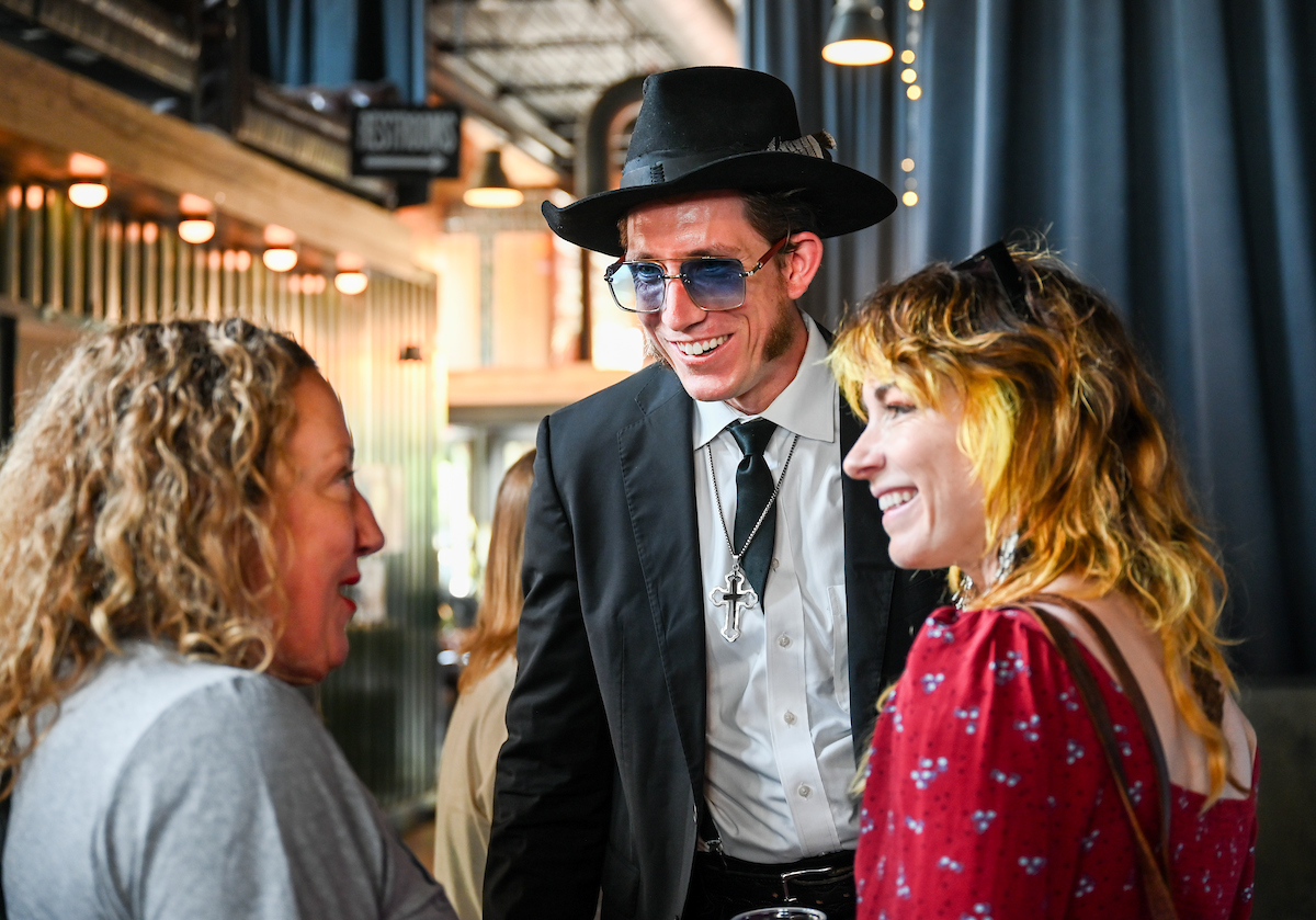 People attend a WUTC fundraiser Sunday, June 22, 2025 at Barrelhouse Ballroom to honor Richard Windham, who is retiring after 40 years.