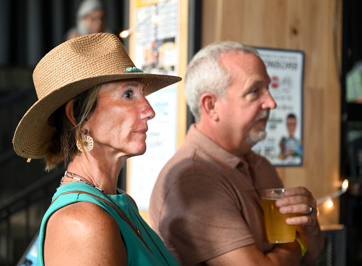 People attend a WUTC fundraiser Sunday, June 22, 2025 at Barrelhouse Ballroom to honor Richard Windham, who is retiring after 40 years.