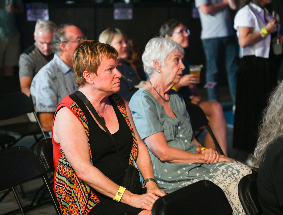 People attend a WUTC fundraiser Sunday, June 22, 2025 at Barrelhouse Ballroom to honor Richard Windham, who is retiring after 40 years.