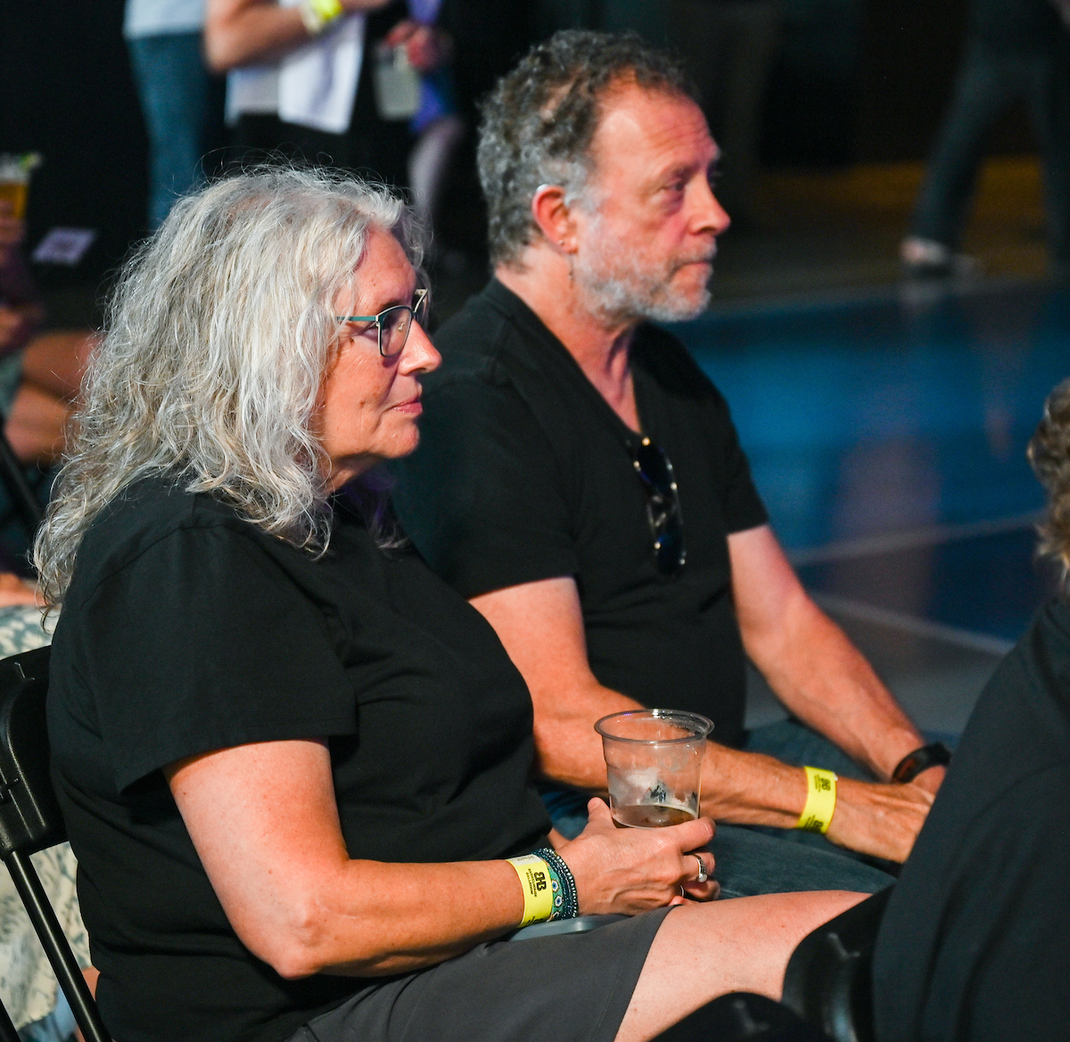 People attend a WUTC fundraiser Sunday, June 22, 2025 at Barrelhouse Ballroom to honor Richard Windham, who is retiring after 40 years.