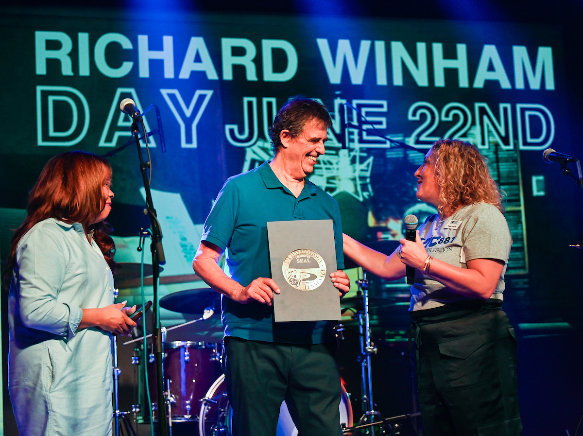 Richard Winham was issued a special proclamation at his retirement benefit concert, declaring June 22 "Richard Winham Day." Photo by Angela Foster.