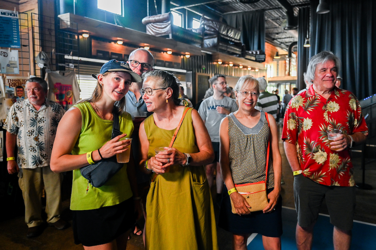 People attend a WUTC fundraiser Sunday, June 22, 2025 at Barrelhouse Ballroom to honor Richard Windham, who is retiring after 40 years.