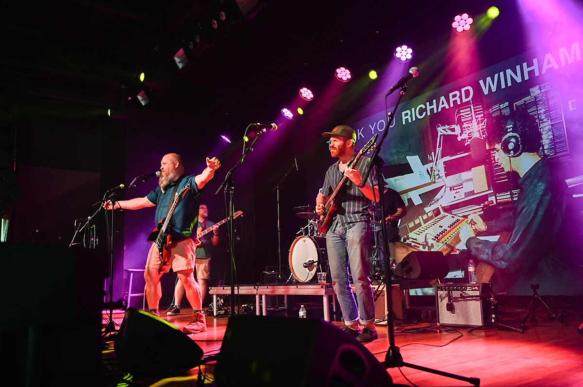 People attend a WUTC fundraiser Sunday, June 22, 2025 at Barrelhouse Ballroom to honor Richard Windham, who is retiring after 40 years.