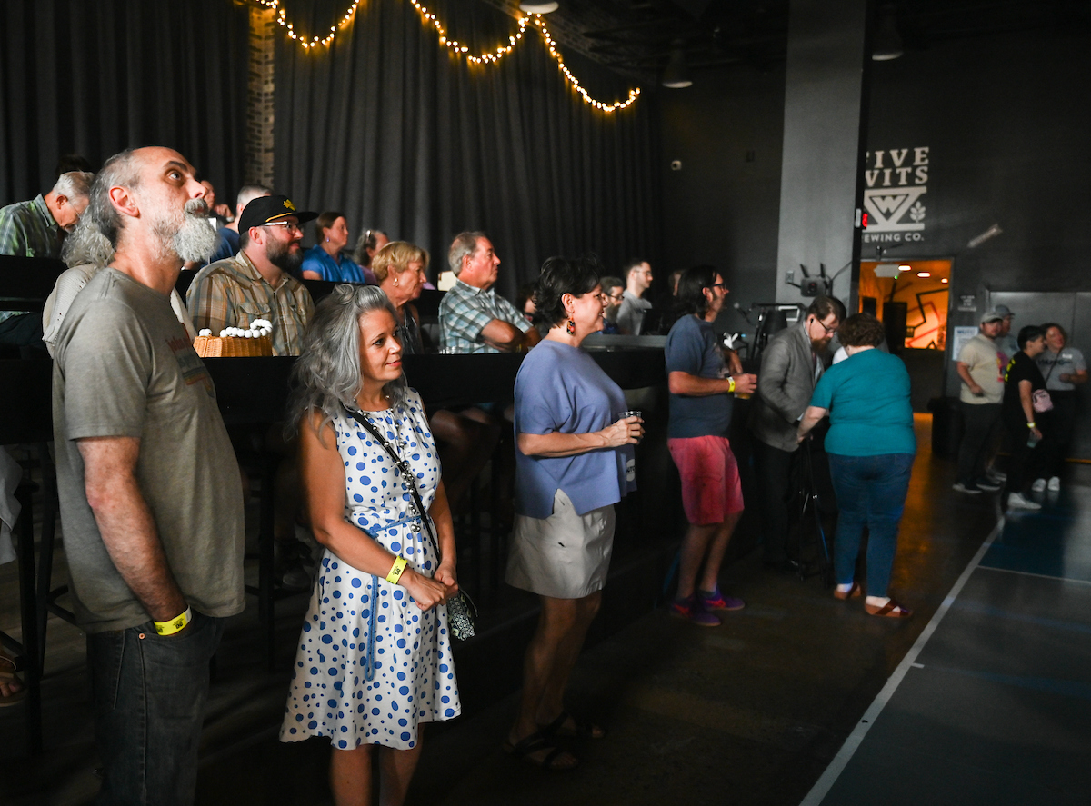 People attend a WUTC fundraiser Sunday, June 22, 2025 at Barrelhouse Ballroom to honor Richard Windham, who is retiring after 40 years.